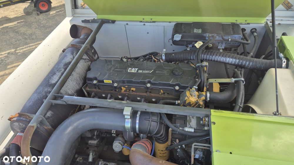 Claas Lexion 660 z hederem - 13