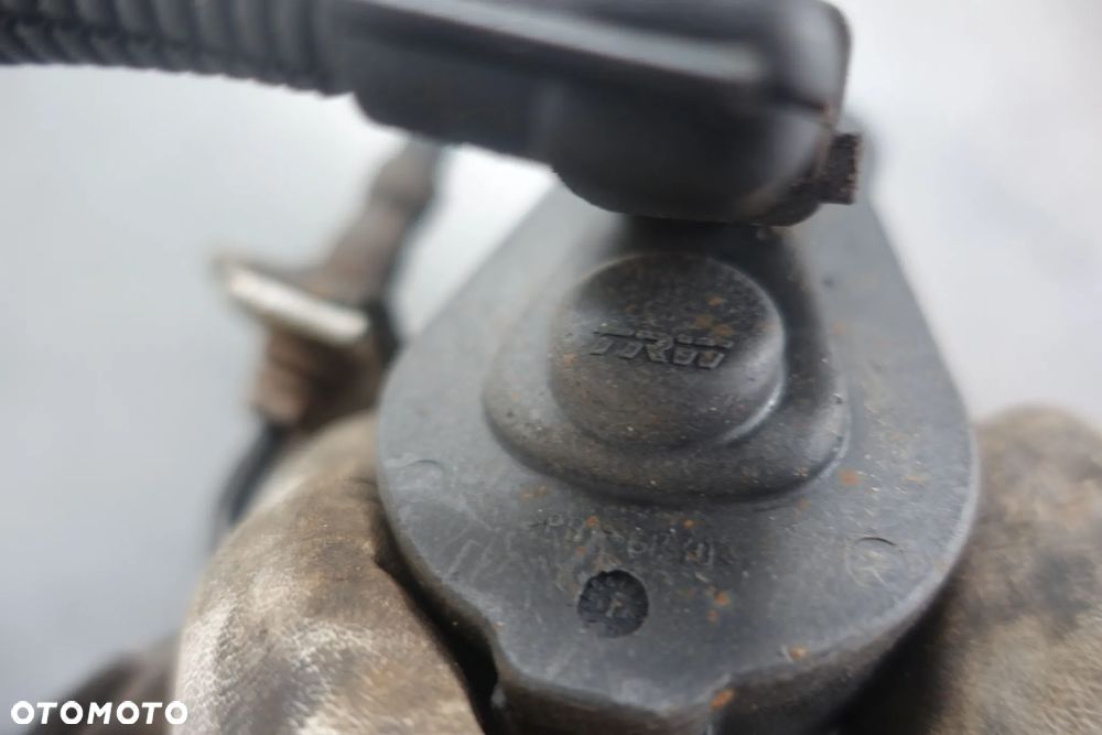 ZACISK PRAWY TYŁ PASSAT B6 - 3