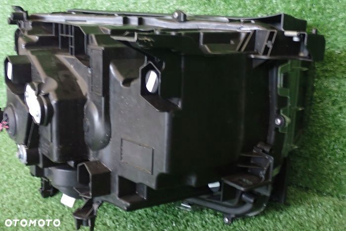 TOYOTA LAND CRUISER J250 J25 24- lampa lewa przednia przód - 9
