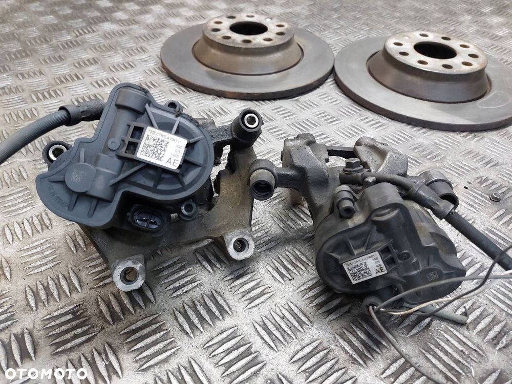 TARCZE HAMULCOWE TYŁ ZACISKI VW PASSAT B8 LIFT 3Q0615405AE 3Q0615406AE - 3