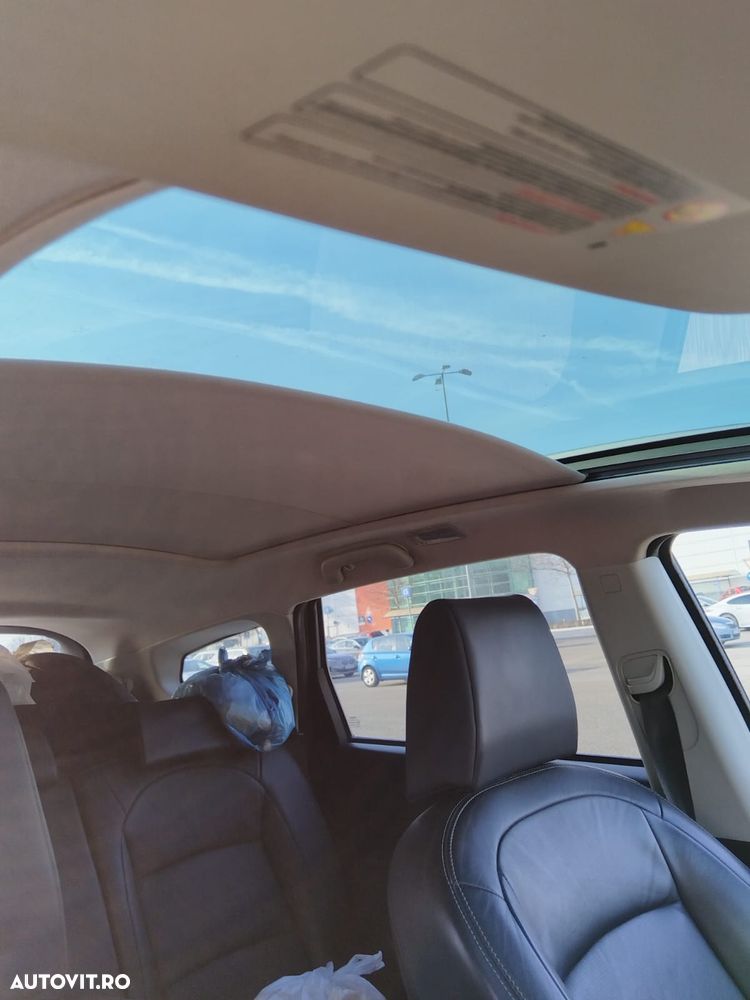 Nissan Qashqai+2 - 2