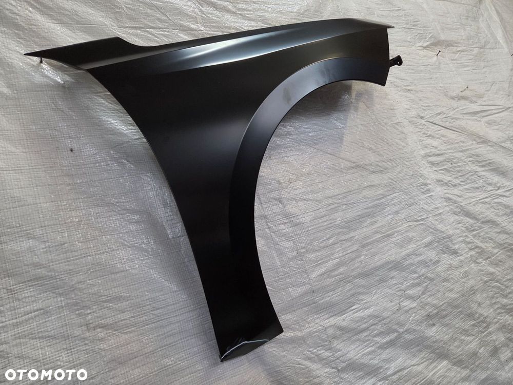 BŁOTNIK PRAWY PRZEDNI OPEL ASTRA L VI 6 9841904880 NOWY ORYGINAŁ - 9