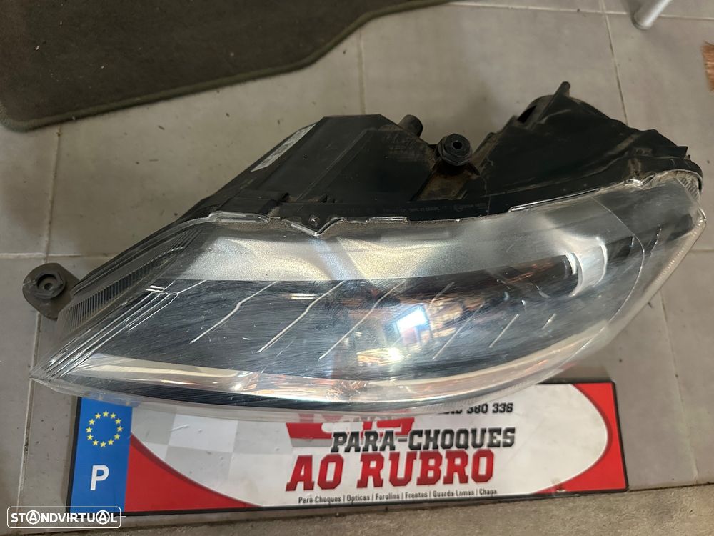 Farol esq Skoda rapid xenon - 2