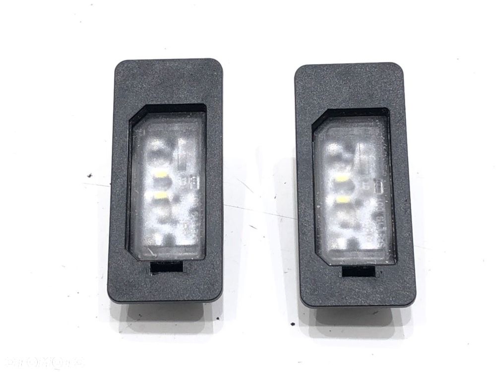 LAMPKI TABLICY REJESTRACYJNEJ  BMW X1 (U11) 2022-2025 s-drive 2.0i 115kW [156KM] BENZYNA 9481841 - 1