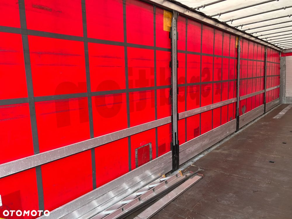 Schmitz Cargobull FIRANKA / 10 SZTUK / BARDZO ŁADNE OPONY / Z PEŁNYM WYPOSAŻENIEM DO ZAŁADUNKU / 2 KOŁA ZAPASOWE / DOSTĘPNE KOLORY SREBRNY - NIEBIESKI - CZERWONY / NIEKTÓRE MAJĄ NOWE PLANDEKI !! - 35