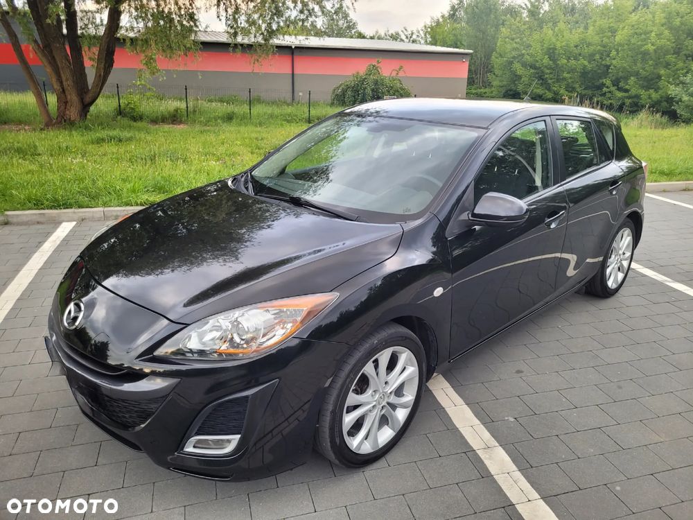 Mazda 3 1.6 MZR Active Plus - 9