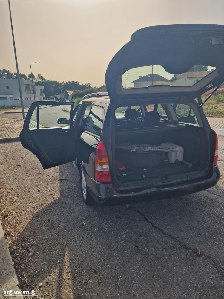 Opel Astra Caravan 1.4i 16V - 10