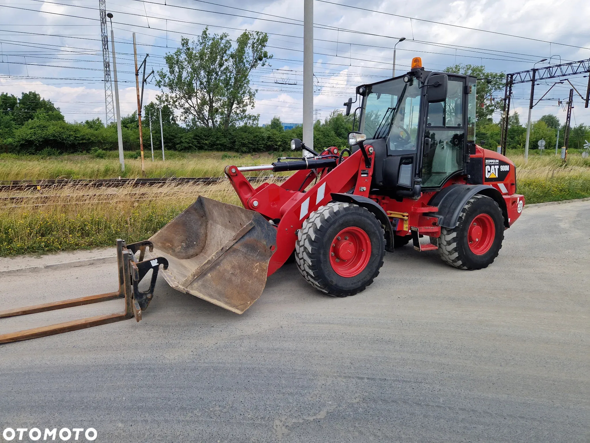 Caterpillar 908M - 2