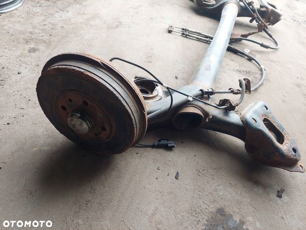 BELKA OŚ ZAWIESZENIA TYŁ BĘBNY Z ABS OPEL CORSA D HB 3D - 4