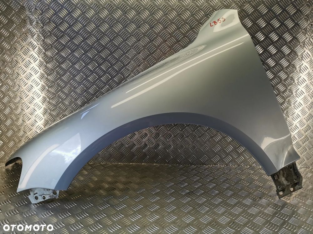 VW TOUAREG 7L 03-06R BŁOTNIK BŁOTNIKI LEWY LB5S