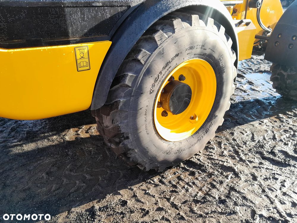 JCB 409 - 13