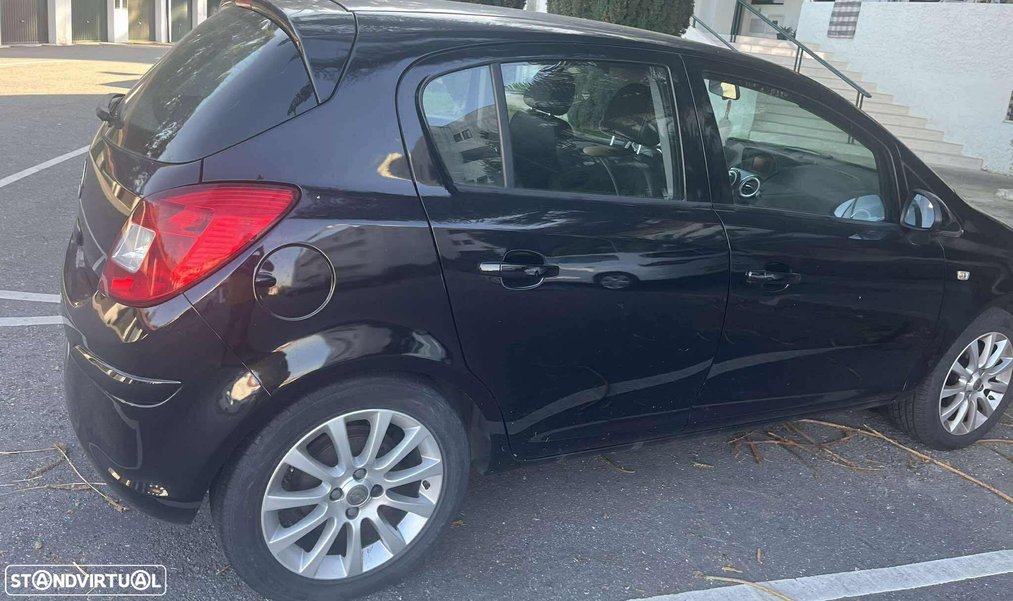 Opel Corsa 1.2 Cosmo - 1