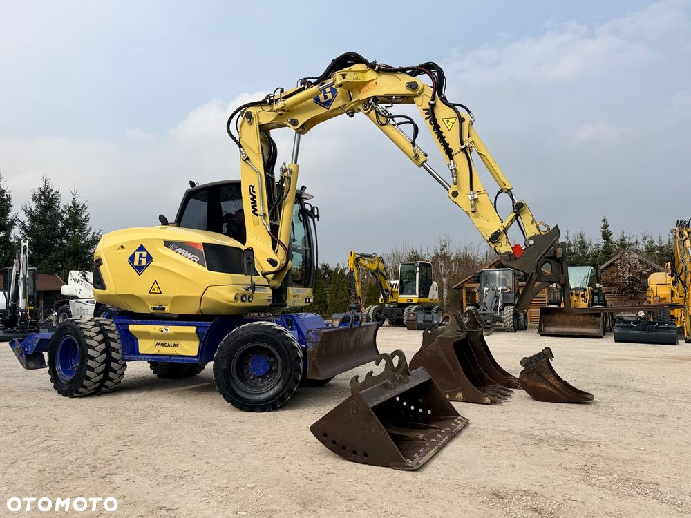 Mecalac Koparka 14 ton MECALAC 15 MWR koparko-ładowarka 3 łyżki widły 1 wł Centr.smarowanie Opony na BLIŹNIAKU 80%Camso ładowarka 714 12MTX 4x4 skrętne KLIMA kabina Premium silnik 146KM volvo EW140B DEUTZ szybka 35km/h - 19