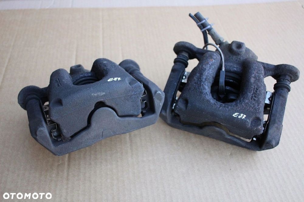 Zaciski hamulcowe przód przednie BMW e90 e91 e92 e93 e87 e81 e82 e88 54/22 - 1