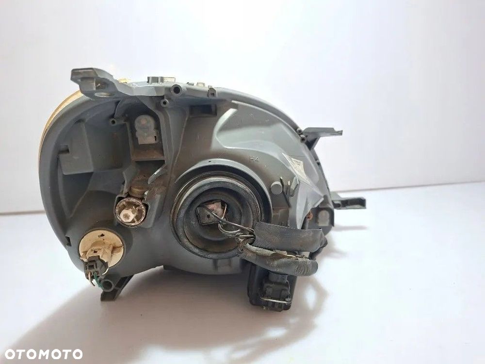 TOYOTA YARIS I LAMPA REFLEKTOR LEWY PRZÓD EUROPA 89008658 811700D080 - 10
