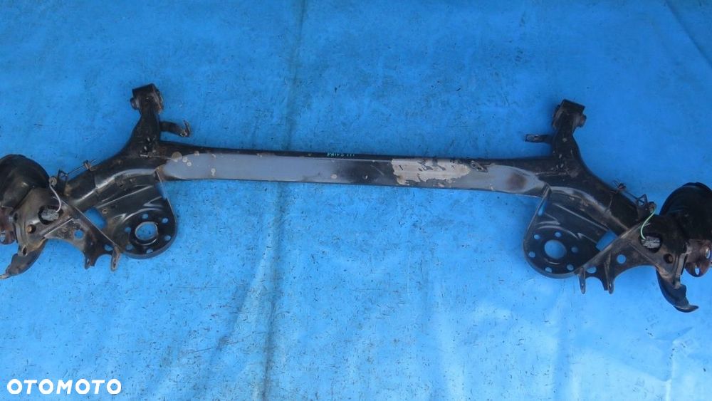 BELKA OŚ ZAWIESZENIE TYŁ TYLNA TOYOTA PRIUS III