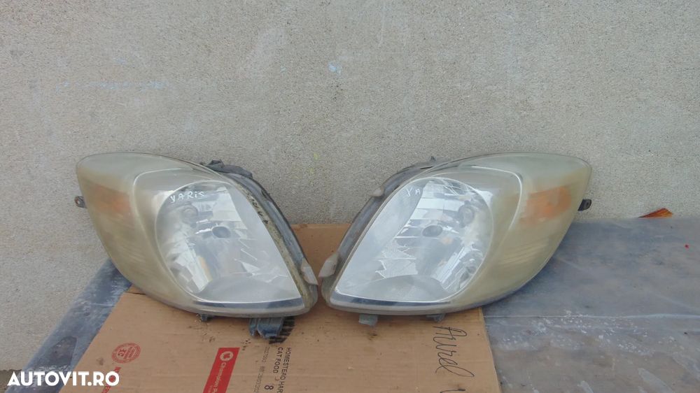 Faruri Toyota Yaris an 2006 cod 89900736 cu defect - 1