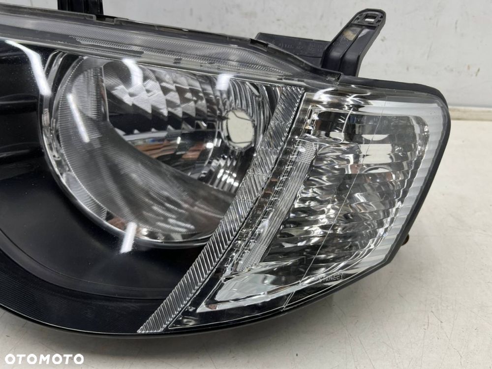 Lampa reflektor Mitsubishi L200 KA KB 05-10r. LEWA przednia H4 oryginalna lewy przód EU 8301b461 - 7