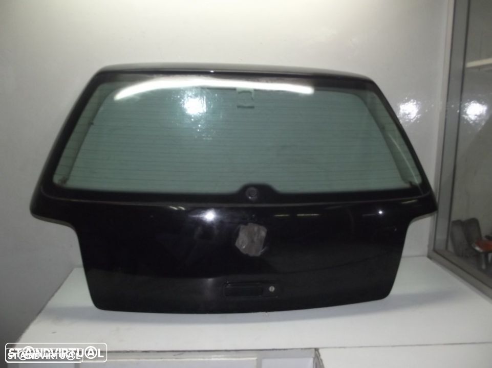 VW Golf tampa da mala - 1