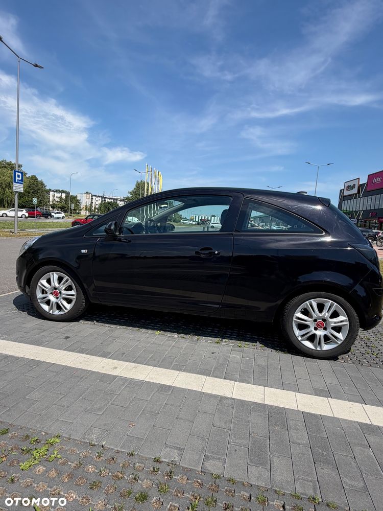 Opel Corsa 1.2 16V Cosmo - 8