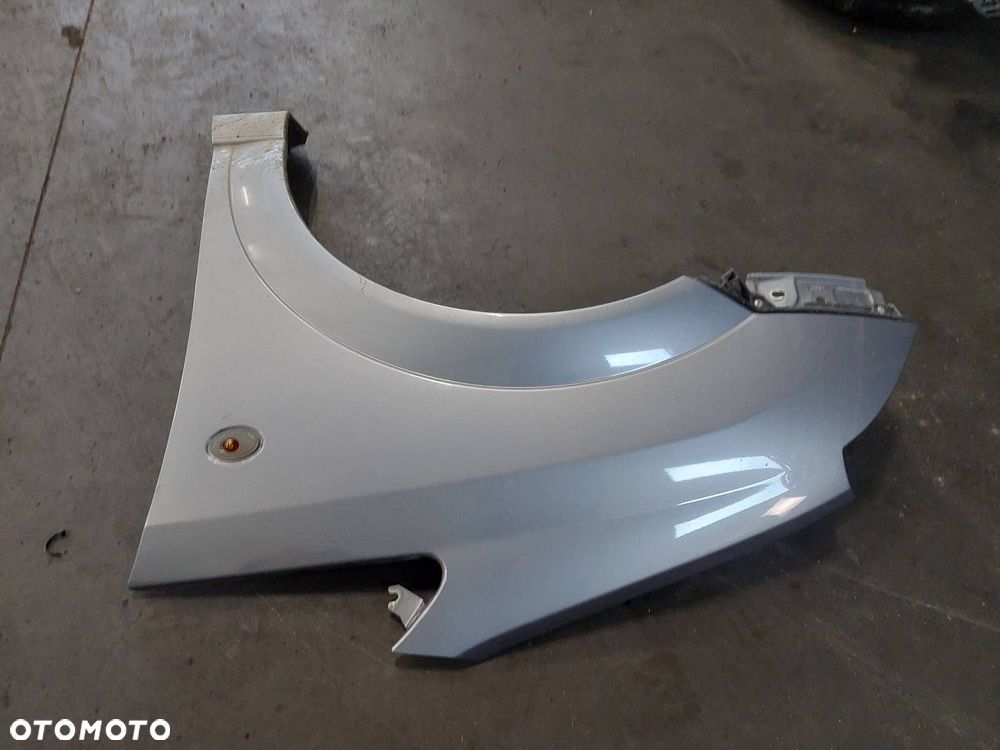 BŁOTNIK LEWY PRZÓD OPEL MERIVA A LIFT Z163 - 2