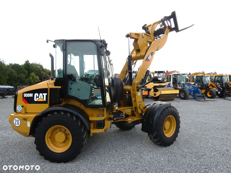 Caterpillar CAT 908M z Niemiec / Tylko 2.855mtg serwisowany / - 37