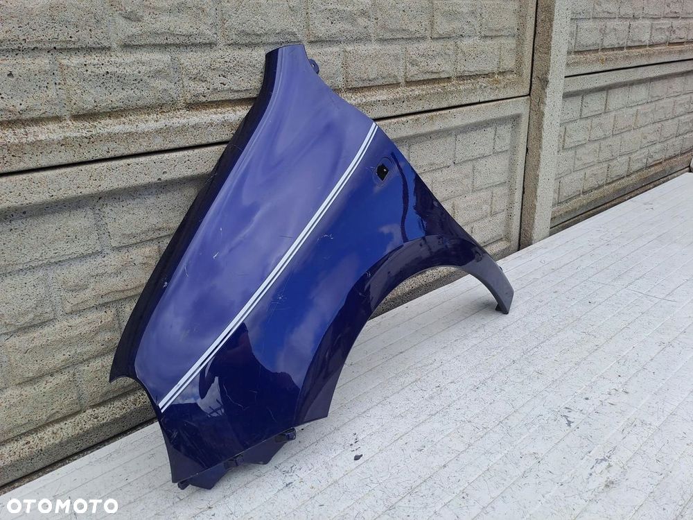 BŁOTNIK LEWY RENAULT TWINGO 3 III 2014 - 2024 - 2