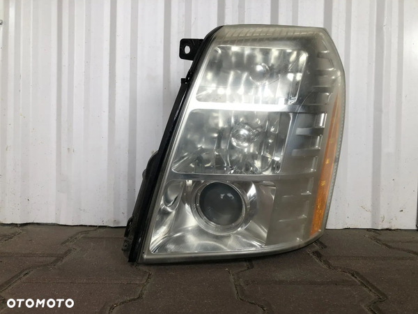 CADILLAC ESCALADE III 6,2 V8 REFLEKTOR LEWY LAMPA XENON USA PRZETWORNICA