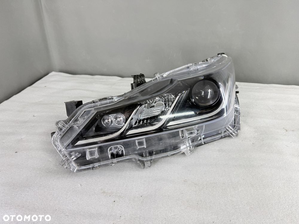 Reflektor lampa przednia lewa Toyota Corolla E210 E21 81150-02T31-00 - 1