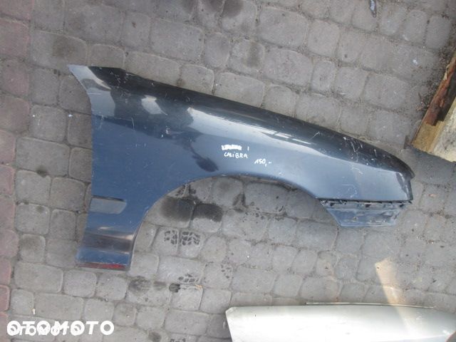 BŁOTNIK OPEL CALIBRA PRAWY - 1
