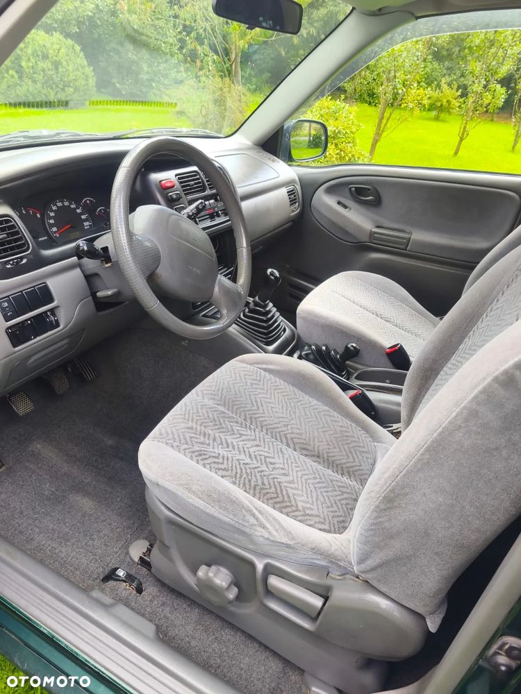 Suzuki Grand Vitara 1.6 - 13