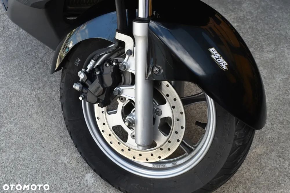 Suzuki Burgman - 24
