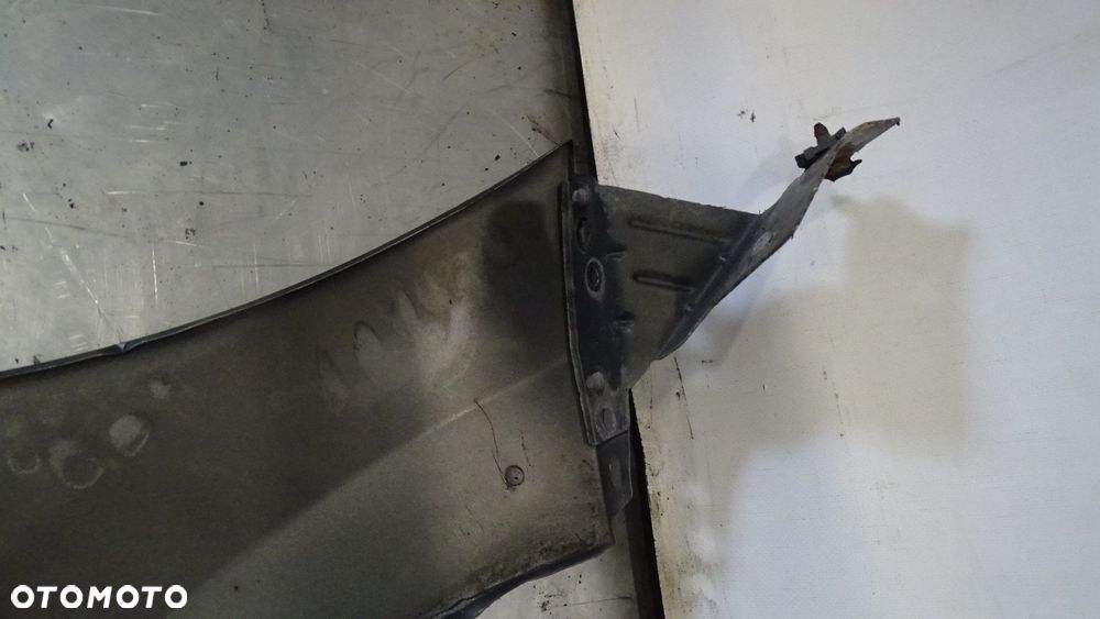 BŁOTNIK LEWY PRZEDNI PEUGEOT 207 1.6VTI SW KOL: KTQ - 7