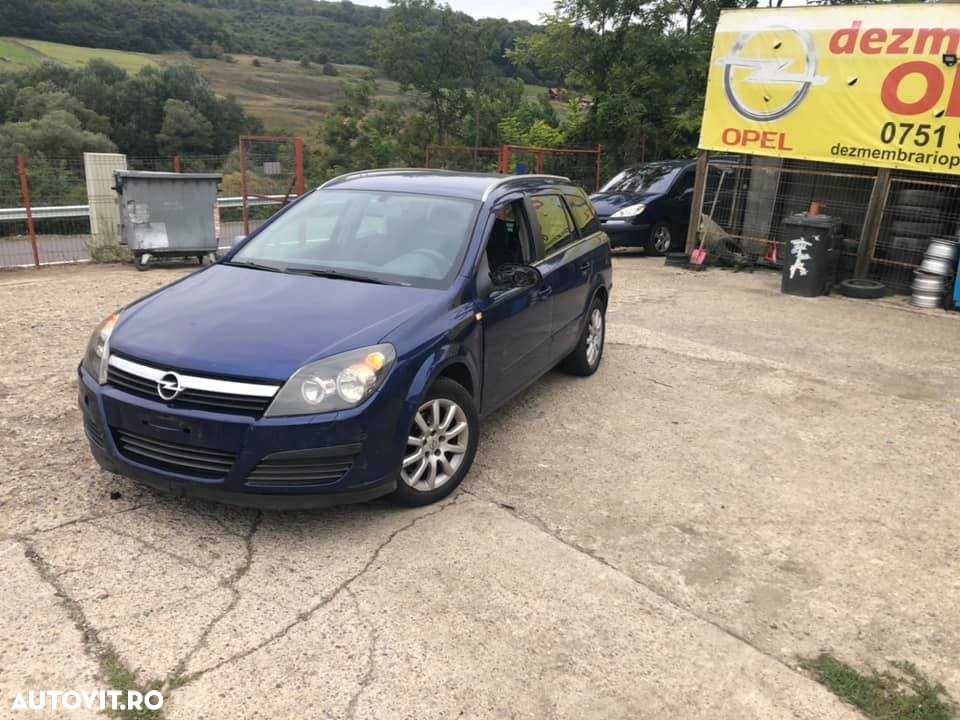 Acoperitoare porbagaj spate Opel Astra H comby - 1