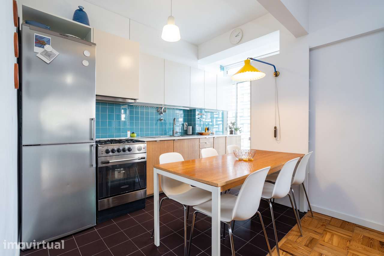 Apartamento T2 Renovado com Vista Rio no Beato: Conforto e Charme Junt - Grande imagem: 4/25
