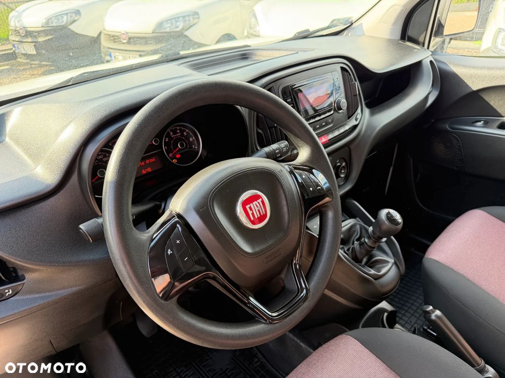 Fiat DOBLO VAN VAT-1 Homologacja cięż. DMC: 2145kg Ładowność 706kg MOCNY SILNIK 1.6 MultiJet, 105KM Emisja Euro-6, Skrzynia biegów 6-cio stopniowa! ORYGINALNA ZABUDOWA PAKI, BOCZNE DRZWI PRZESUWNE, RADIO FABRYCZNE, Hak 1300kg, PODGRZEWANE FOTELE Z REG. I PODŁOKIETNIKIEM, BAGAŻNIK DACHOWY ORYGINALNY FIAT, PARKTRONIKI, ALARM.. - 8