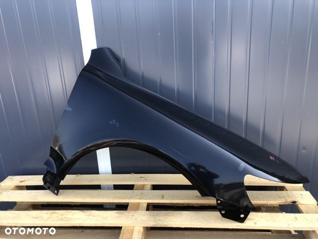 VW Touareg 7L0 lift 2007-2010 błotnik prawy - 1