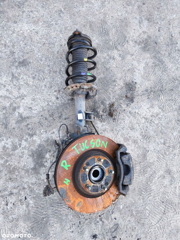 KIA SPORTAGE IV HYUNDAI TUCSON II III ZWROTNICA MCPHERSON PRAWY PRZÓD