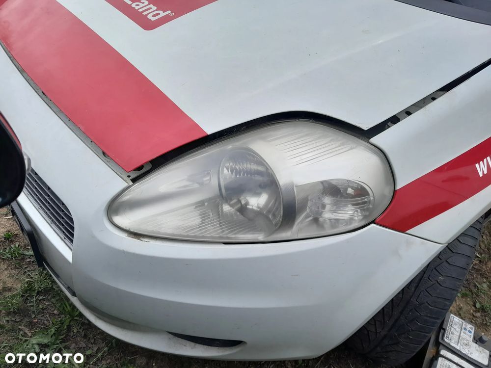 Lampa przednia lewa FIAT Grande Punto 05-12r. Europa - 1