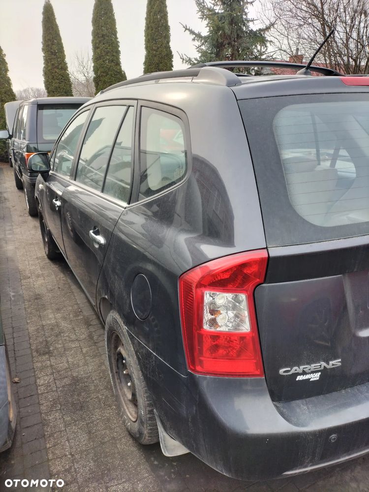 KOMPLET FOTELI  SKÓRZANYCH PRZÓD TYŁ 3 RZĄD KIA CARENS III 06-12r KOD LAK. 1U - 7