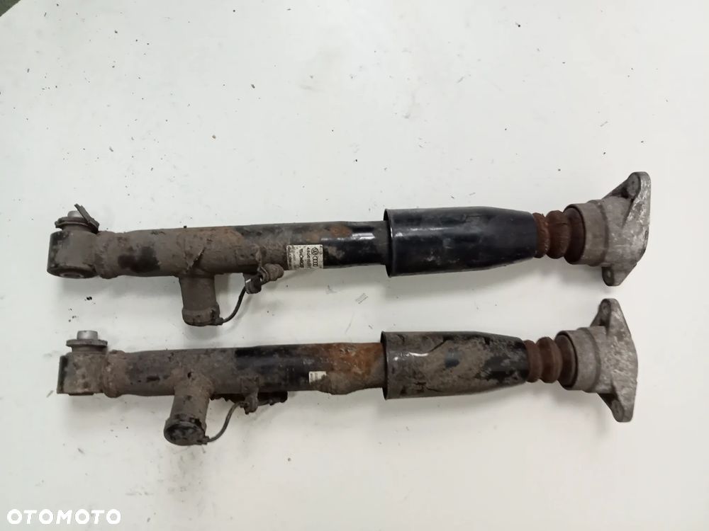 amortyzatory tył audi a 6 c6 4f0616031j - 1