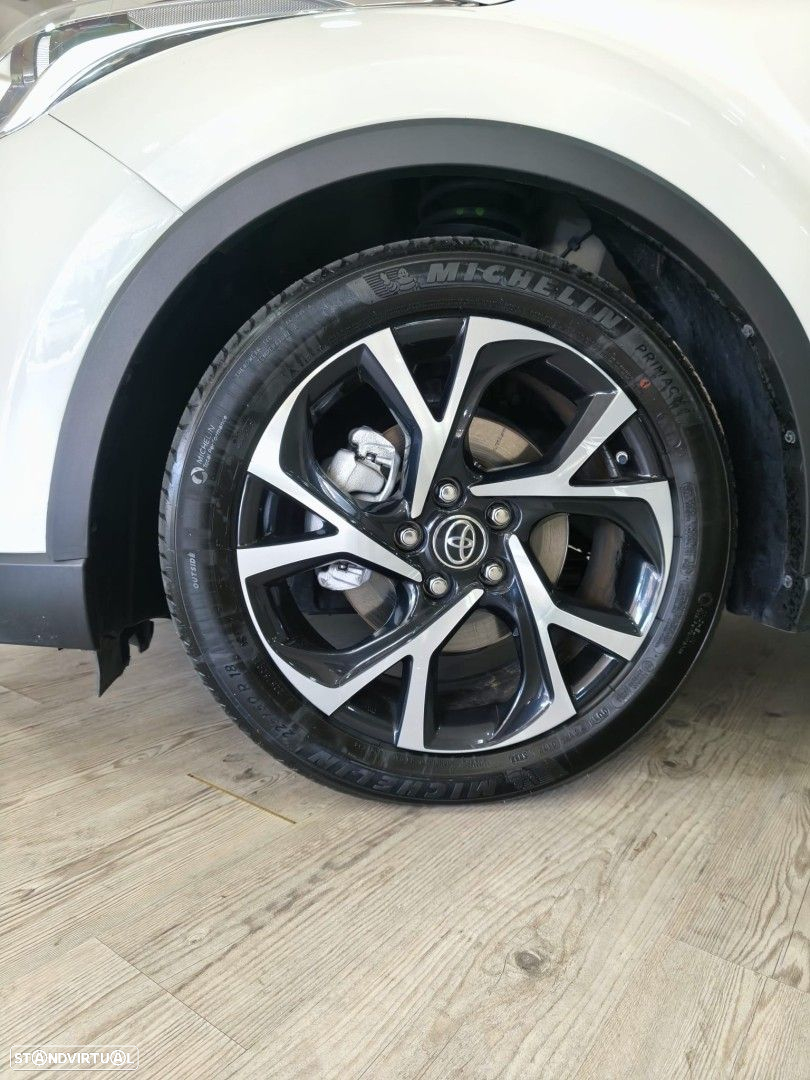 Toyota C-HR 1.8 HSD Exclusive+P.Luxury - 26