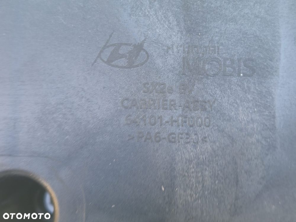 HYUNDAI KONA III EV 2023 2026 Wzmocnienie czołowe przednie przód Pas przedni plastikowy Oryginał 64101HF000 - 7