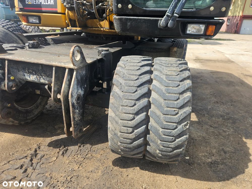 Caterpillar M313c - 8