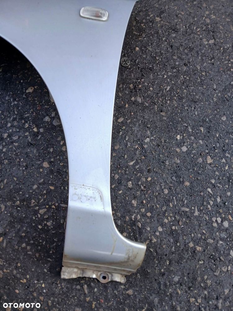 Honda Civic VII 3D Błotnik lewy, prawy - 3