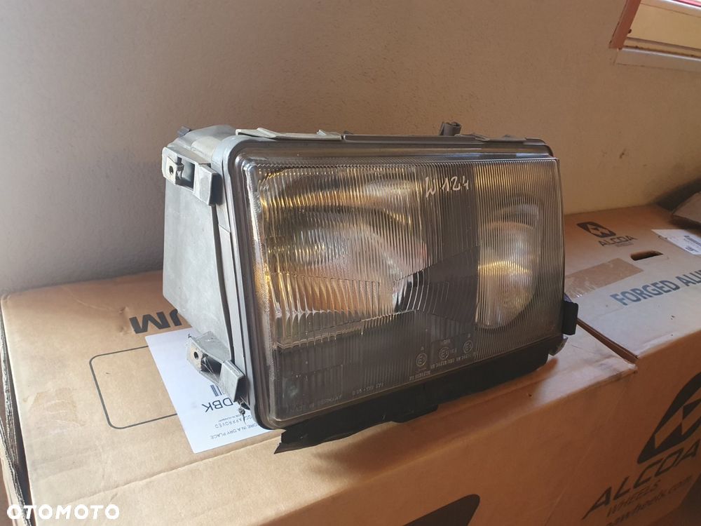 REFLEKTOR PRAWY MERCEDES W124 HELLA - 3
