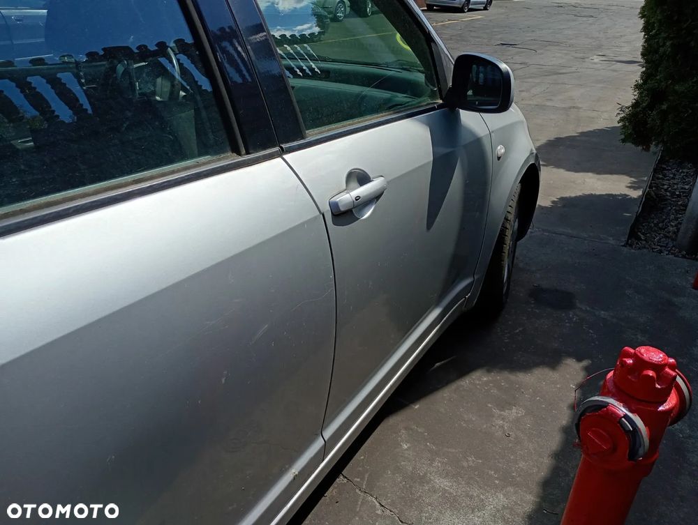 SUZUKI SWIFT 04-08 1.3 M13A - OSLONA  PRZECIWSLONECZNA LEWA PRAWA - 10