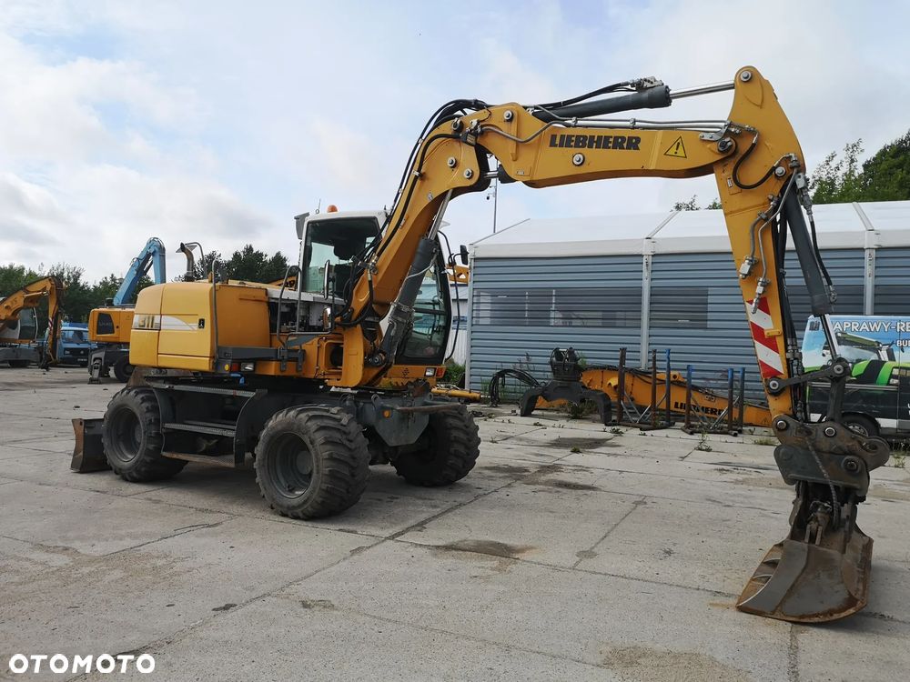 Liebherr A 311 - 4