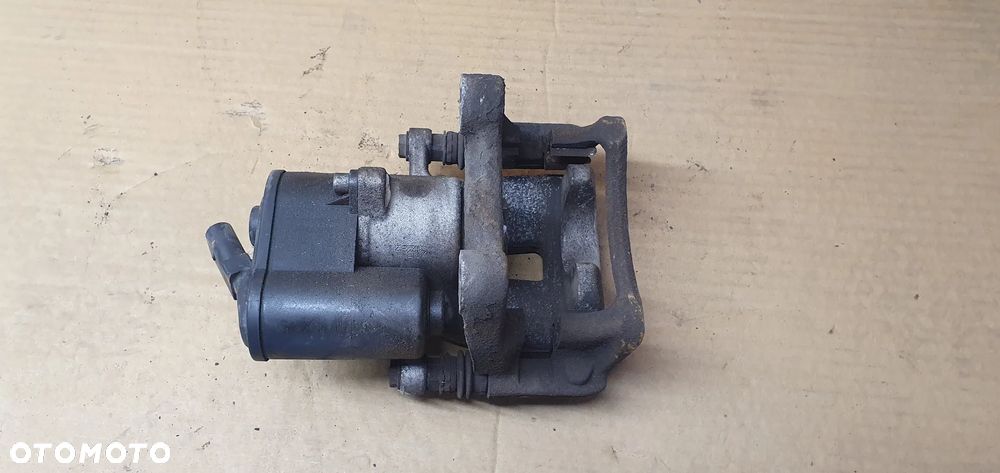Zacisk hamulcowy lewy tył tylny lewy VW Passat B6 - 6