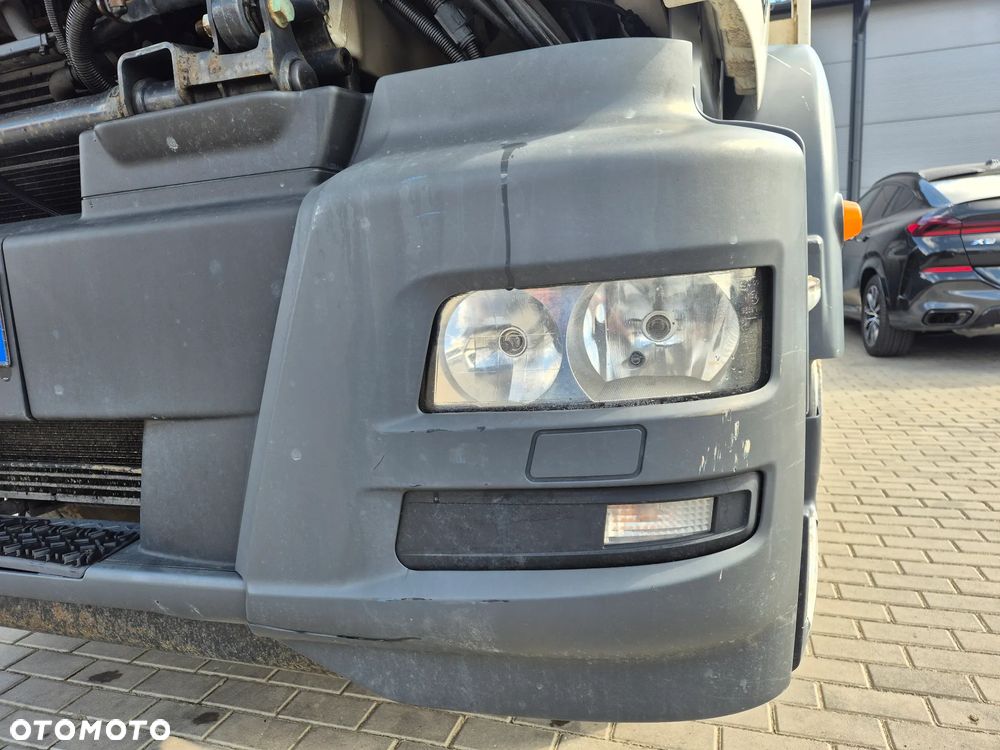 ZDERZAK OKULAR LAMPY REFLEKTORA LEWY MAN TGM EURO 6 KOŁA 22,5 - 1